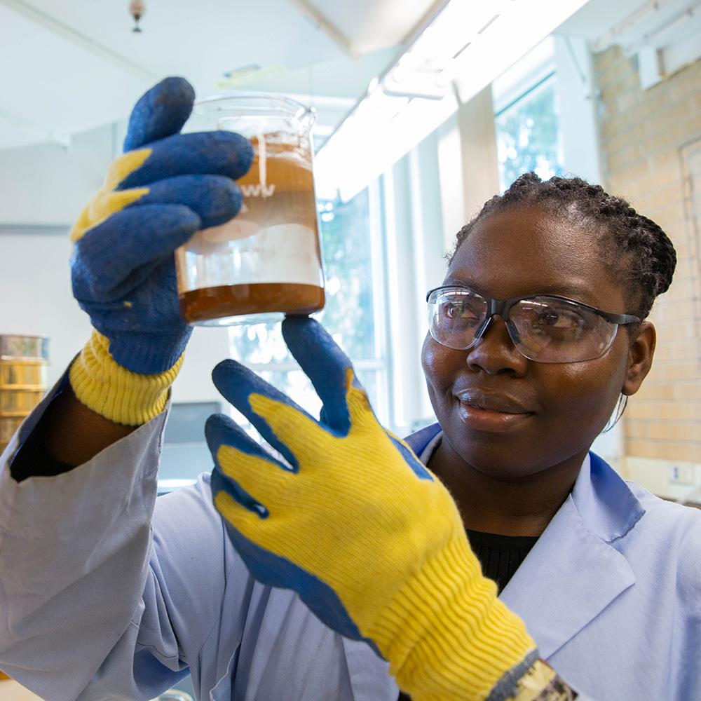 Mines graduate student working in a research lab
